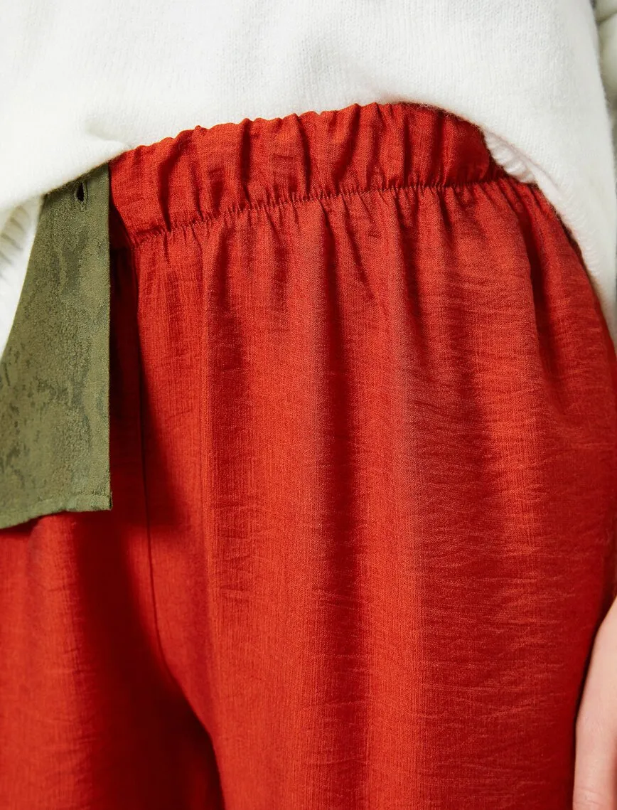 16356 Burnt Orange Leg Button Trousers