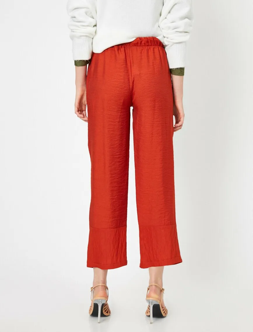 16356 Burnt Orange Leg Button Trousers
